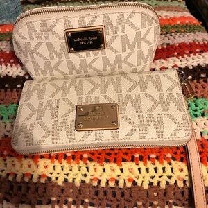 SOLD!!!Authentic MK make up pouch and long wallet.